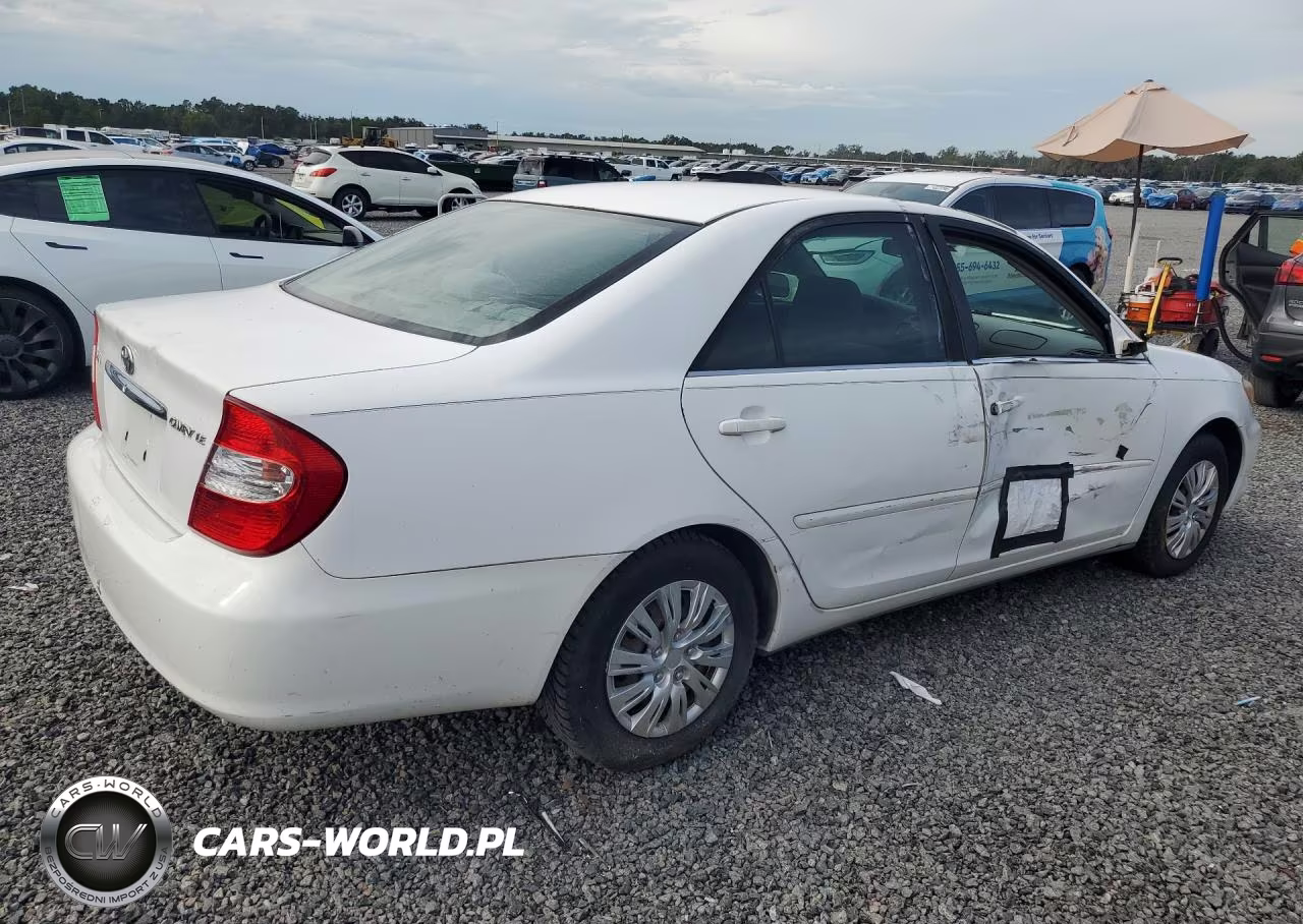 2002 Toyota Camry Le VIN:JTDBE32K320128469 - 3