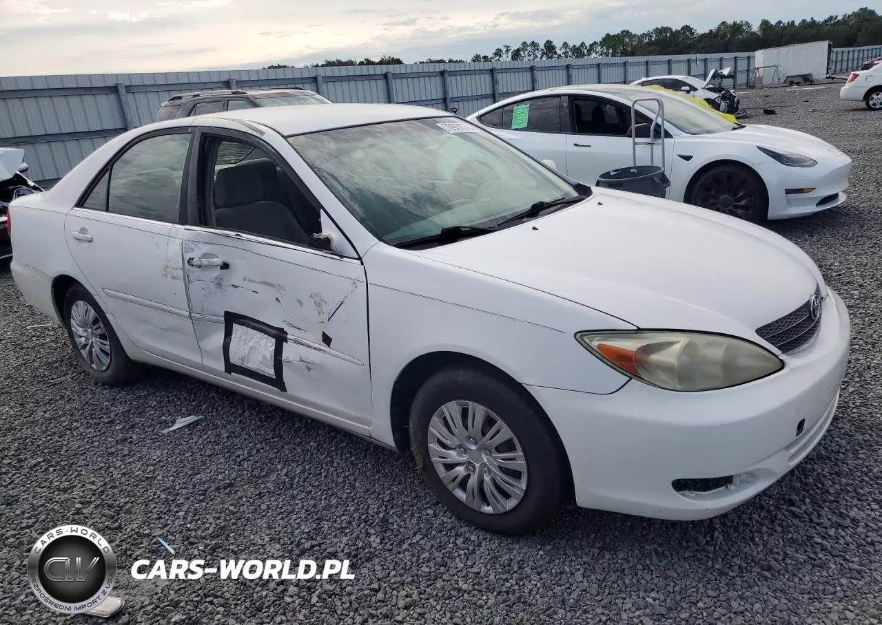 2002 Toyota Camry Le VIN:JTDBE32K320128469 - 4