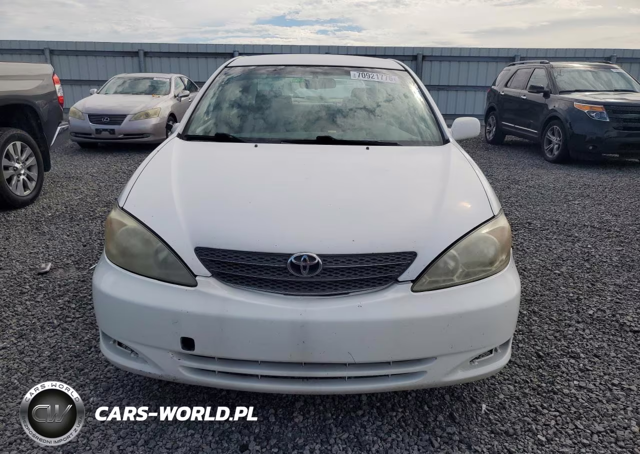 2002 Toyota Camry Le VIN:JTDBE32K320128469 - 5