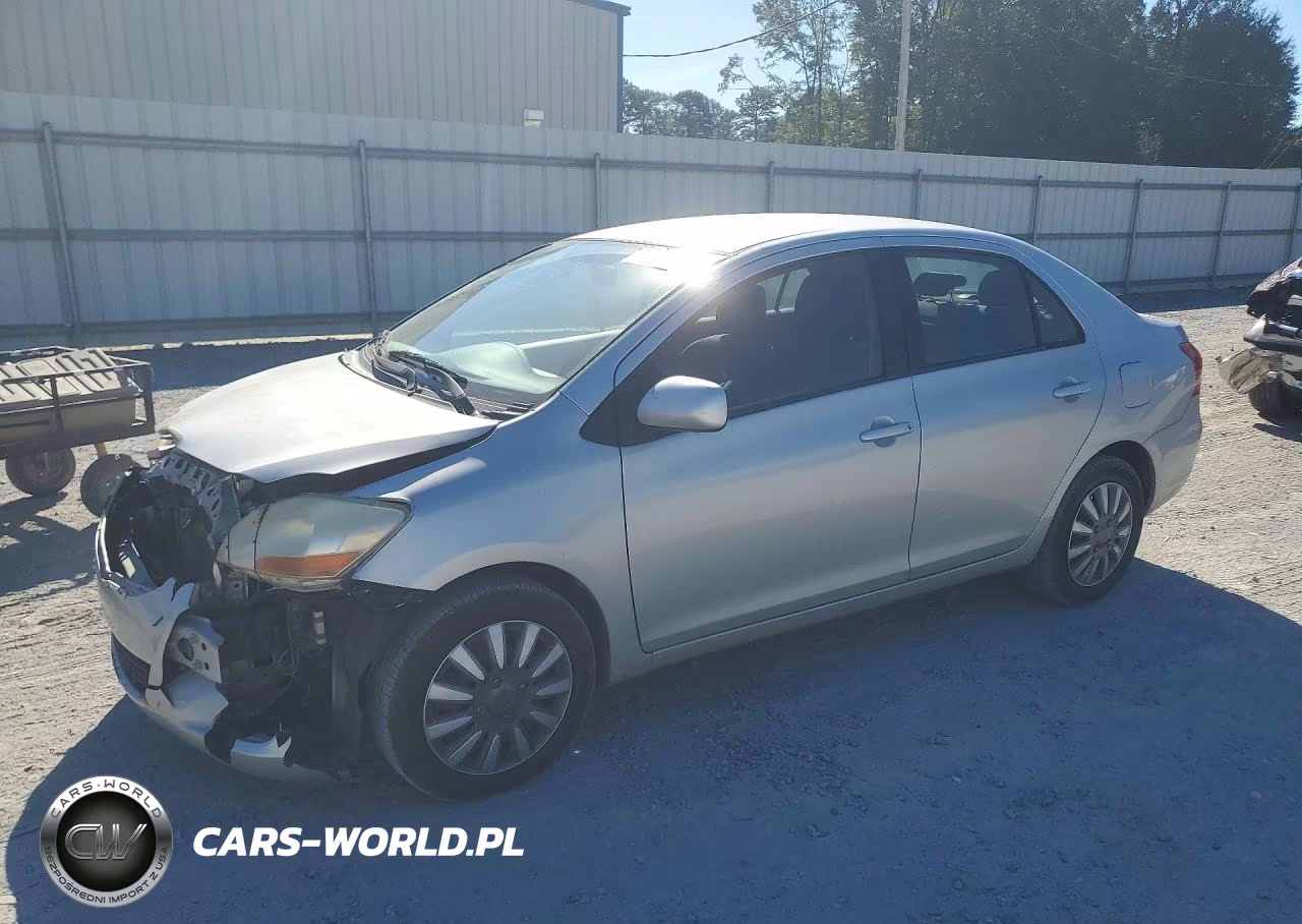 2011 Toyota Yaris Base VIN:JTDBT4K33B4082980 - 1