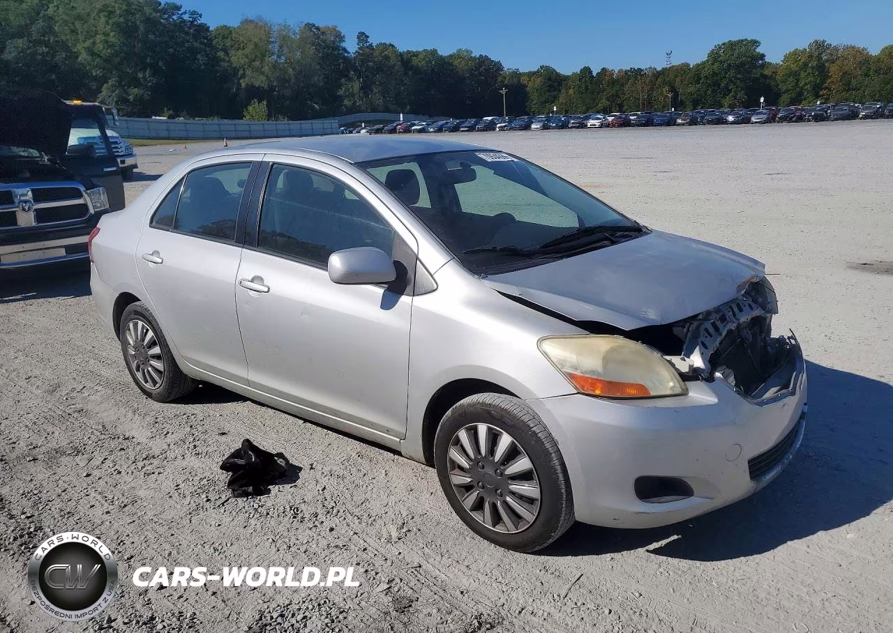 2011 Toyota Yaris Base VIN:JTDBT4K33B4082980 - 4