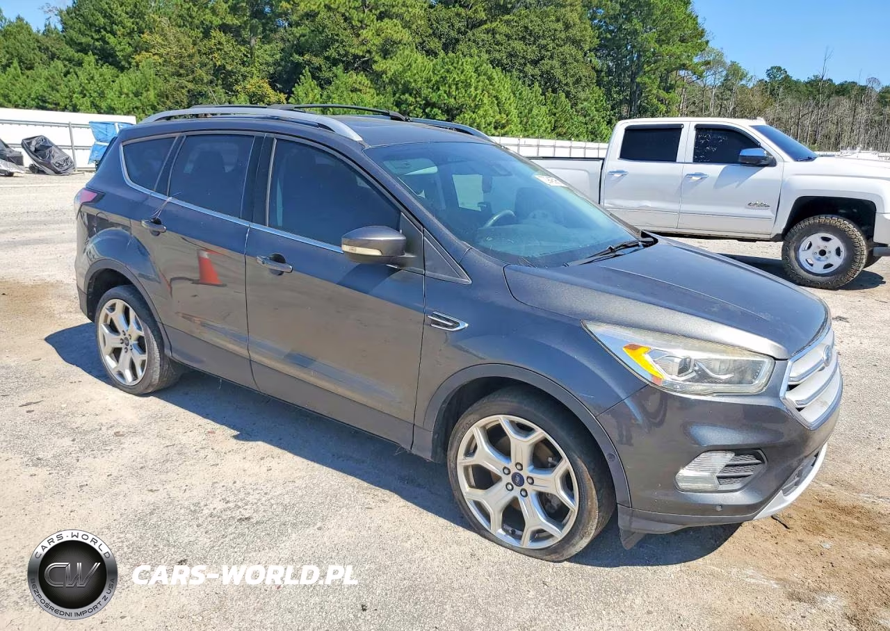 2018 Ford Escape Titanium VIN:1FMCU0J97JUA16474 - 4