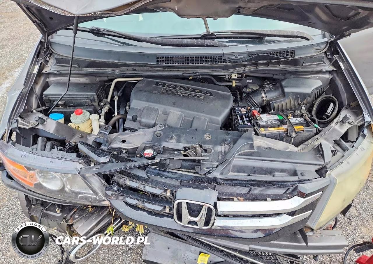 2014 Honda Odyssey Touring VIN:5FNRL5H93EB130765 - 12