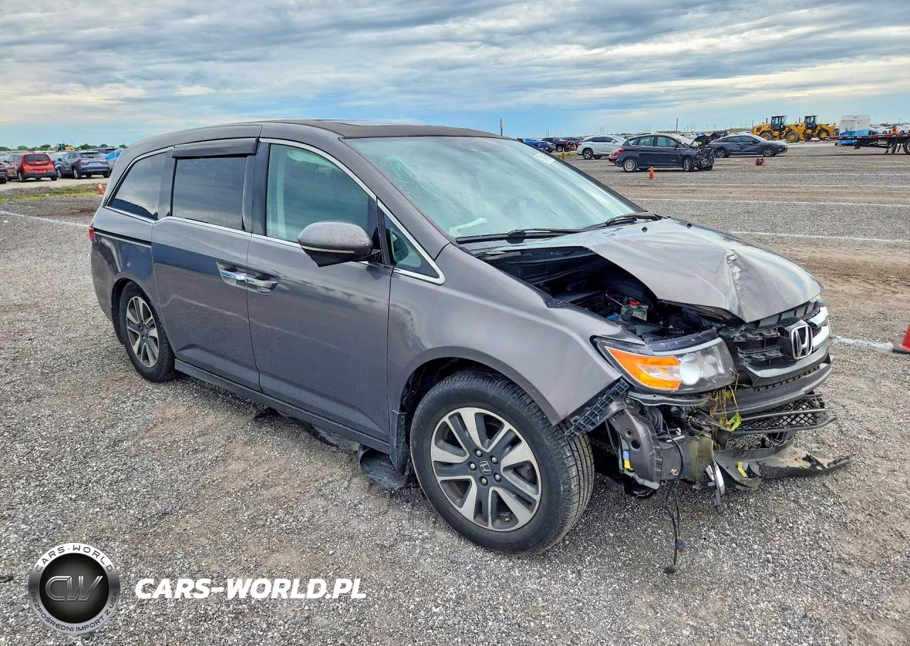 2014 Honda Odyssey Touring VIN:5FNRL5H93EB130765 - 4