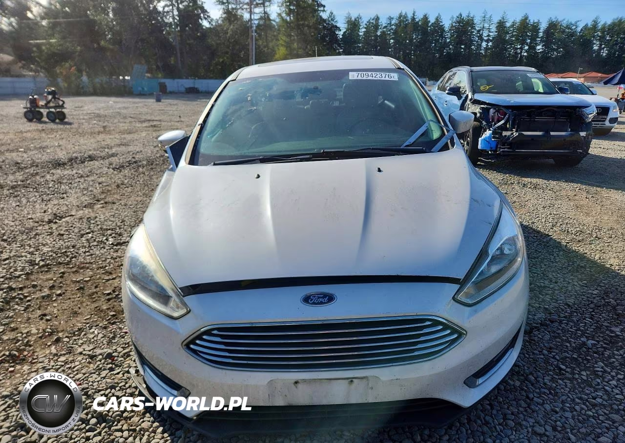 2017 Ford Focus Titanium VIN:1FADP3J24HL287857 - 5