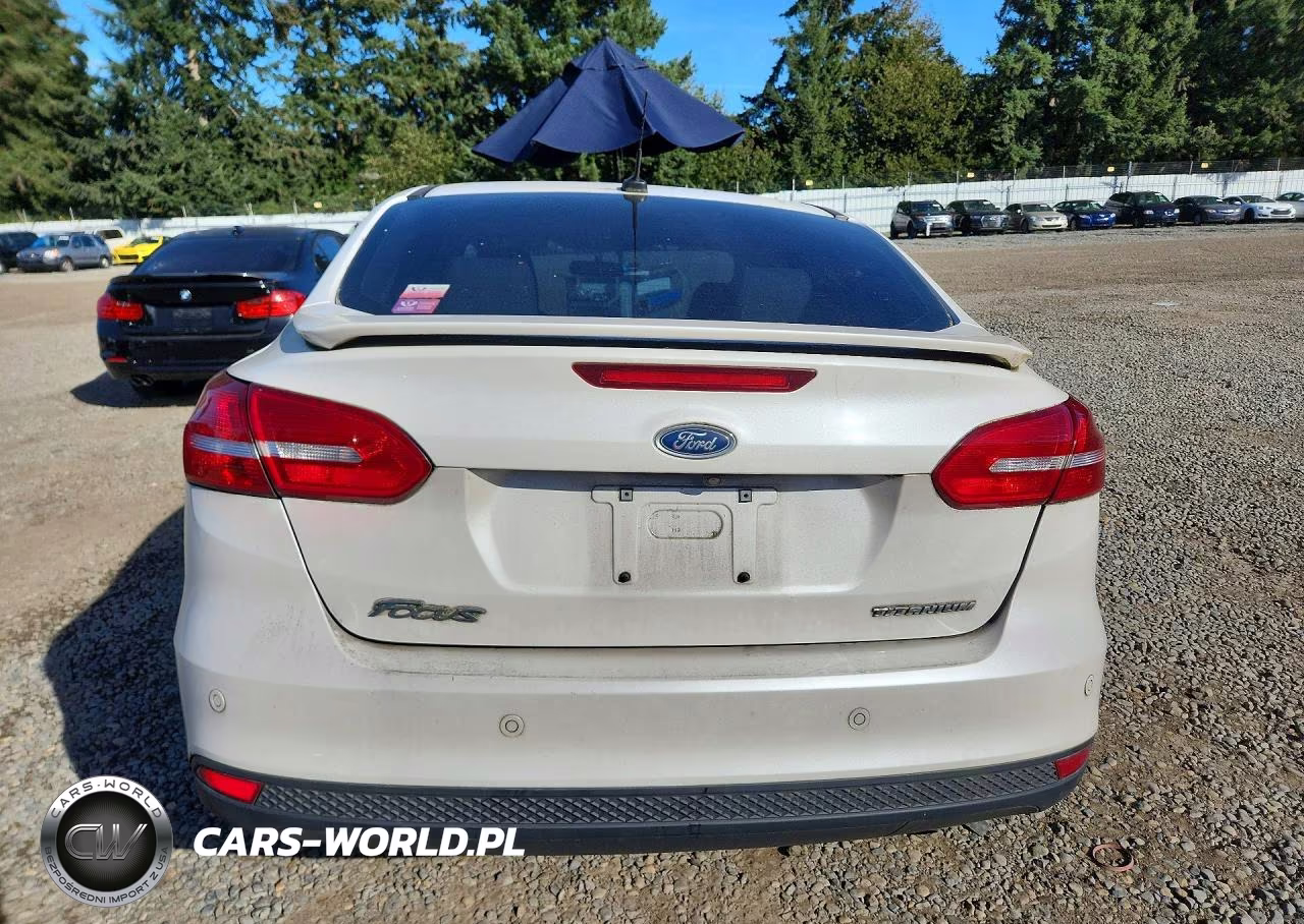 2017 Ford Focus Titanium VIN:1FADP3J24HL287857 - 6