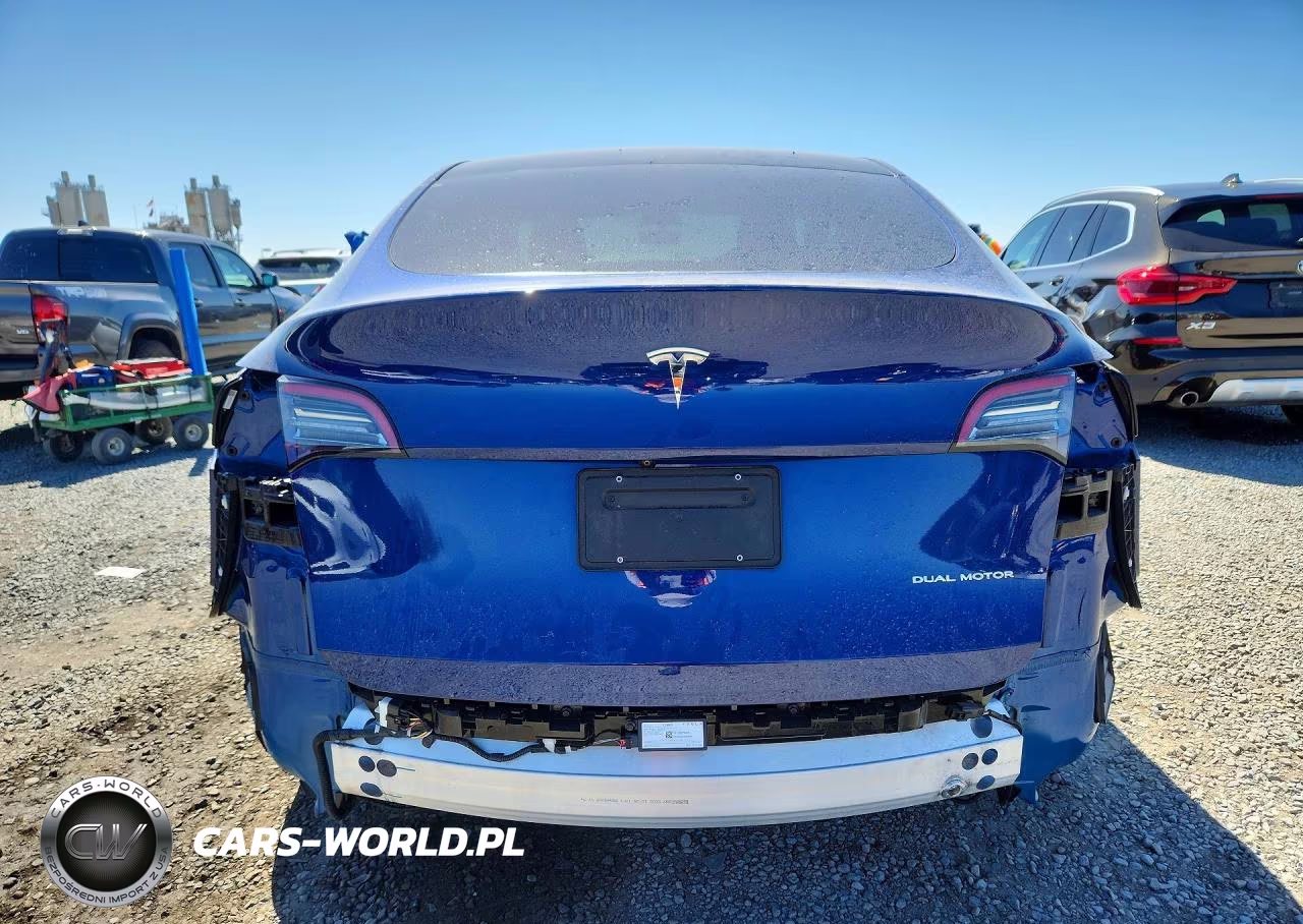 2023 Tesla Model Y VIN:7SAYGDEE2PA031322 - 6
