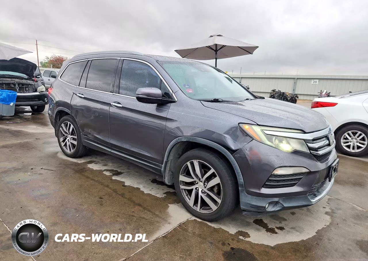 2016 Honda Pilot Elite VIN:5FNYF6H03GB125370 - 4