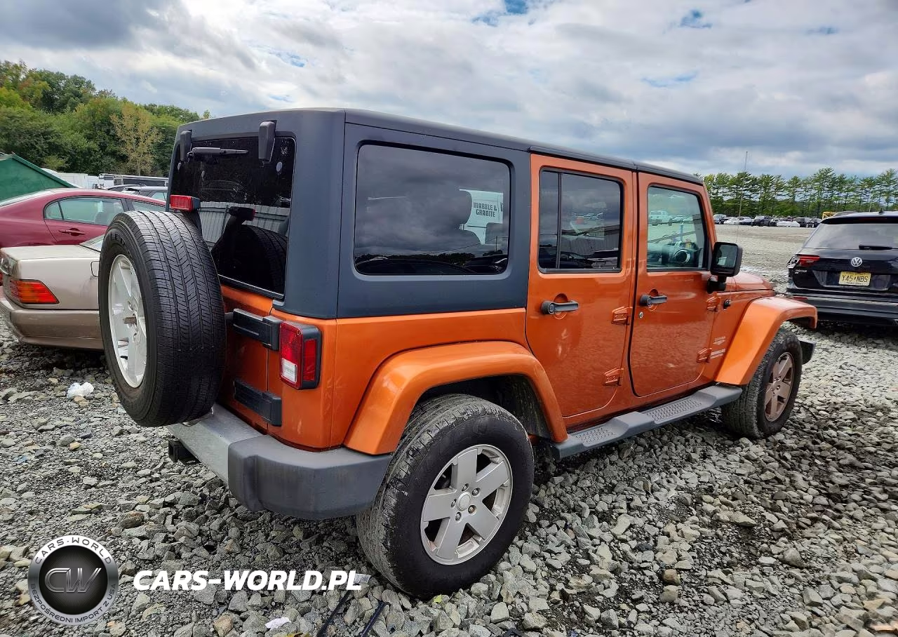 2011 Jeep Wrangler Unlimited Sahara VIN:1J4HA5H1XBL520017 - 3
