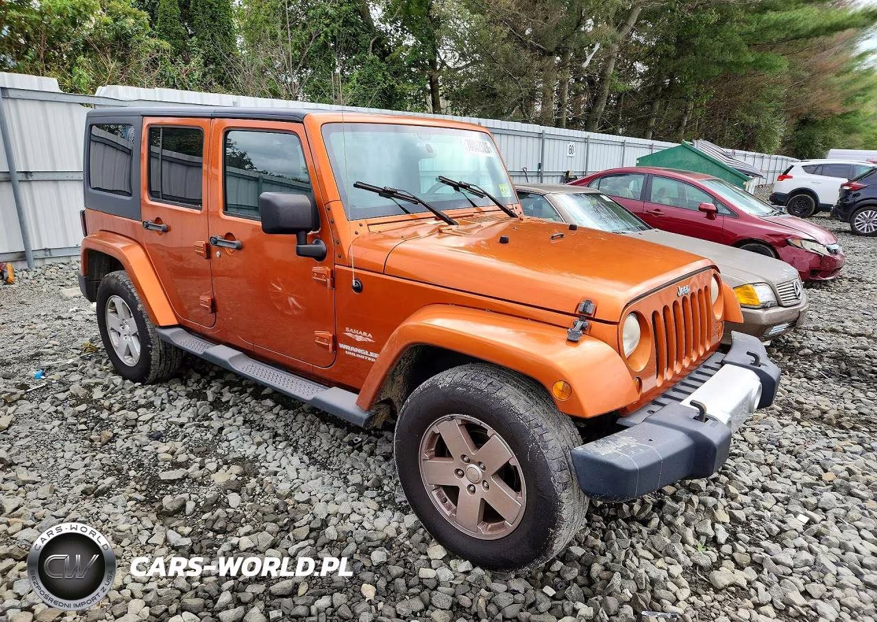 2011 Jeep Wrangler Unlimited Sahara VIN:1J4HA5H1XBL520017 - 4