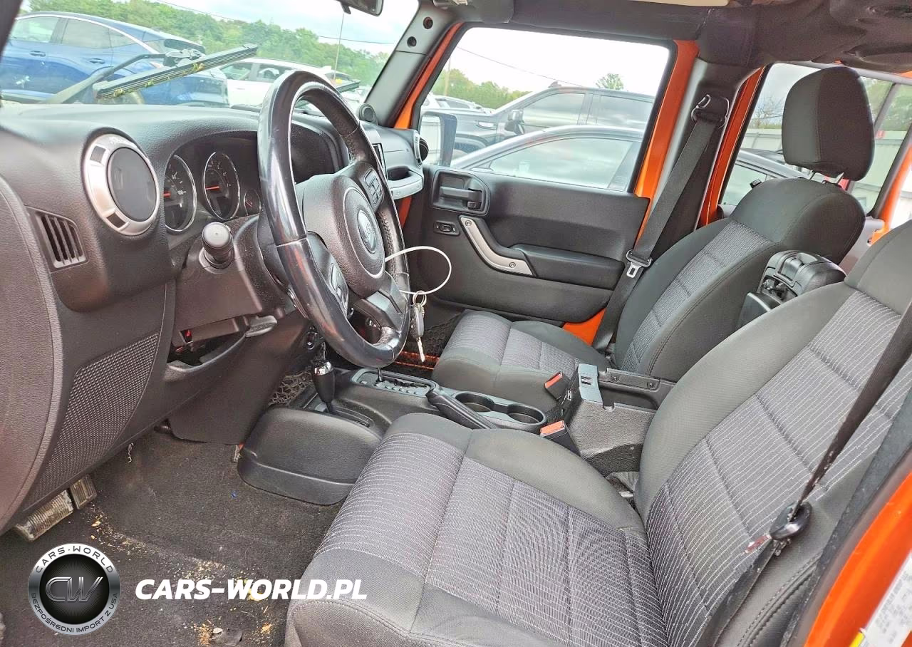 2011 Jeep Wrangler Unlimited Sahara VIN:1J4HA5H1XBL520017 - 7
