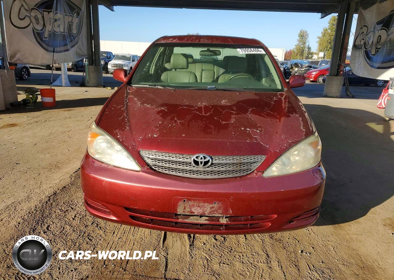 2002 Toyota Camry Le VIN:JTDBE32K020092420 - 5
