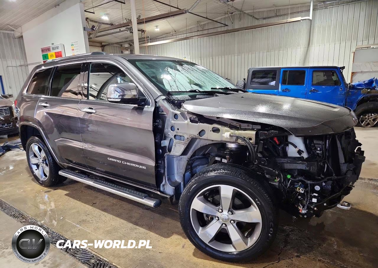 2015 Jeep Grand Cherokee Overland VIN:1C4RJFCG5FC913991 - 4