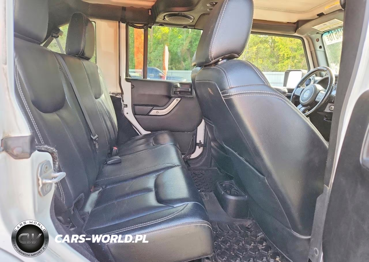 2013 Jeep Wrangler Unlimited Sahara VIN:1C4BJWEG8DL557855 - 11