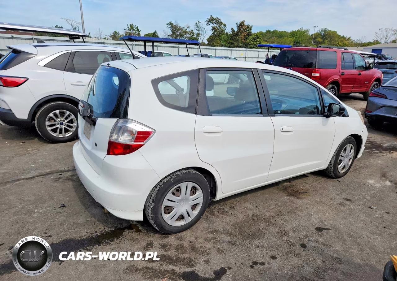 2009 Honda Fit VIN:JHMGE88239S024412 - 3