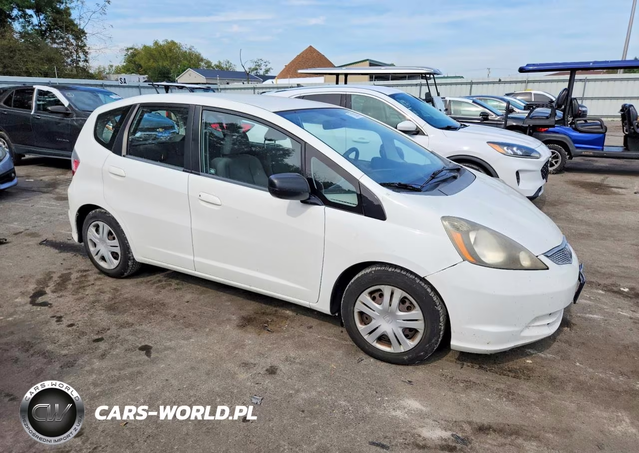 2009 Honda Fit VIN:JHMGE88239S024412 - 4