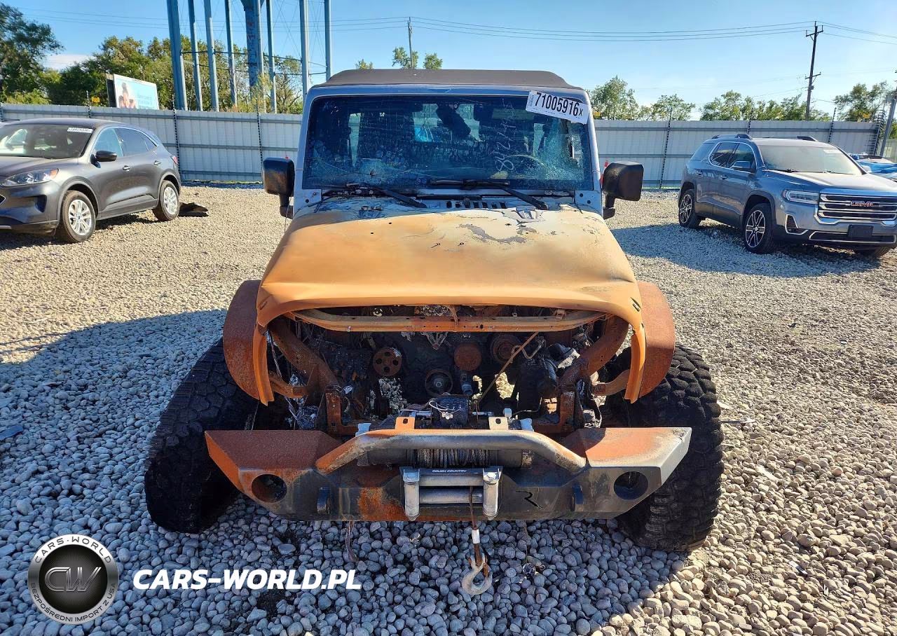 2014 Jeep Wrangler Unlimited Sahara VIN:1C4BJWEG0EL233817 - 5