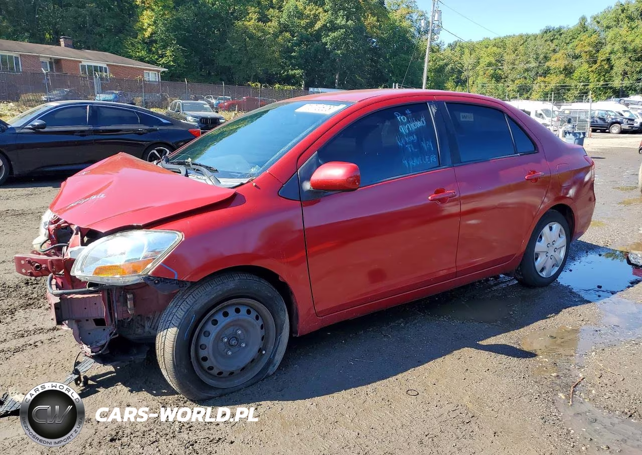 2009 Toyota Yaris Base VIN:JTDBT903891324223 - 1