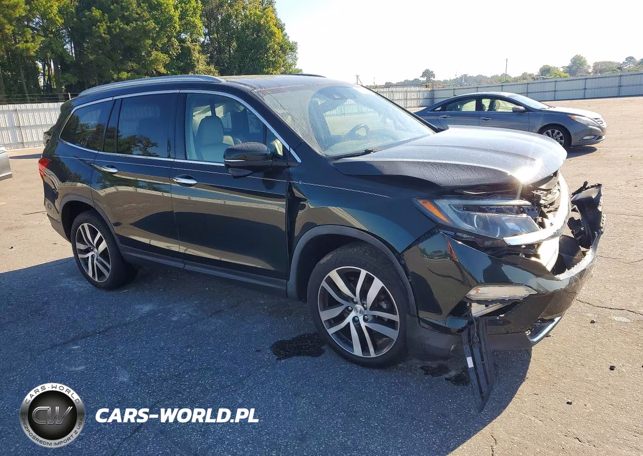 2018 Honda Pilot Touring VIN:5FNYF6H90JB021232 - 4
