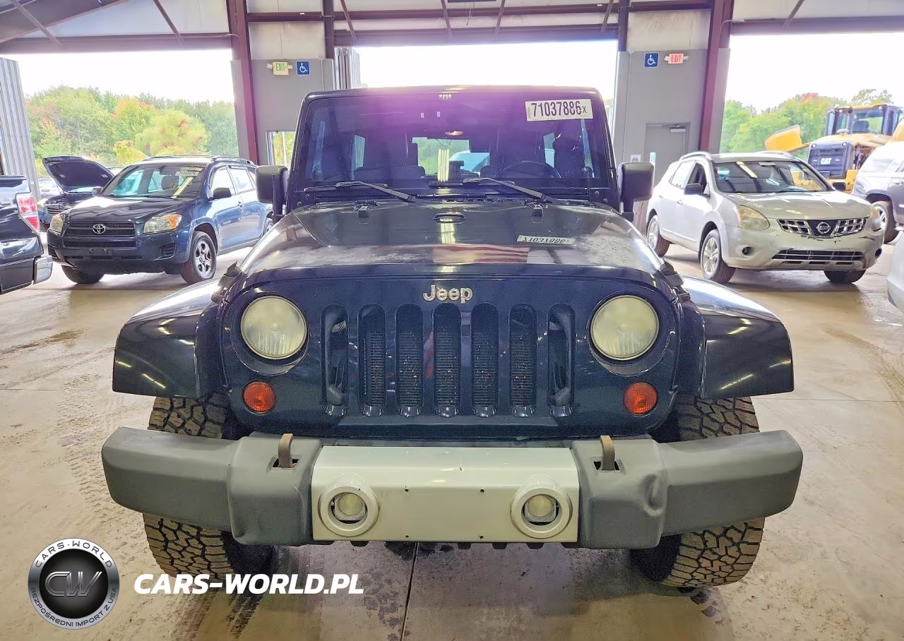 2010 Jeep Wrangler Unlimited Sahara VIN:1J4HA5H19AL157272 - 5