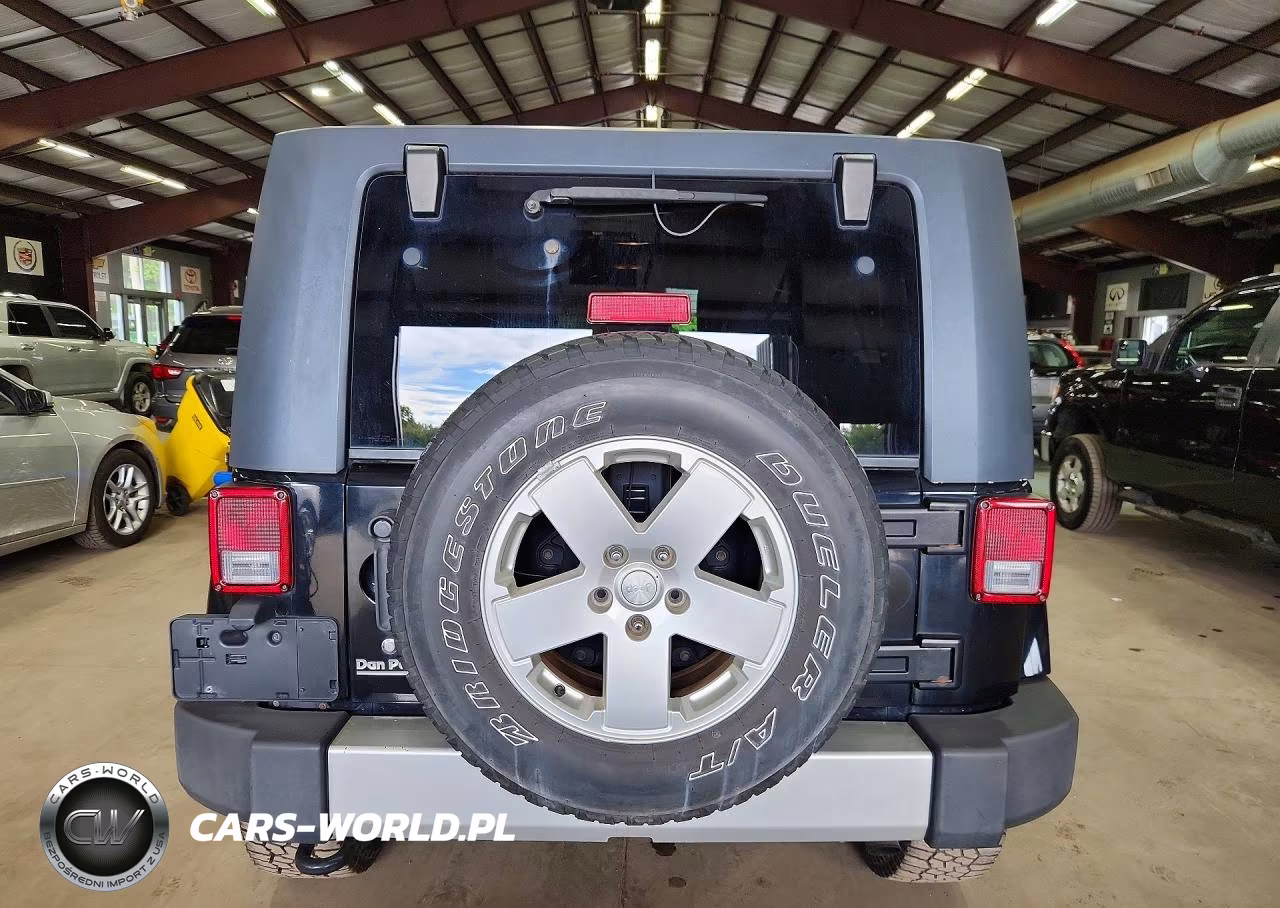 2010 Jeep Wrangler Unlimited Sahara VIN:1J4HA5H19AL157272 - 6