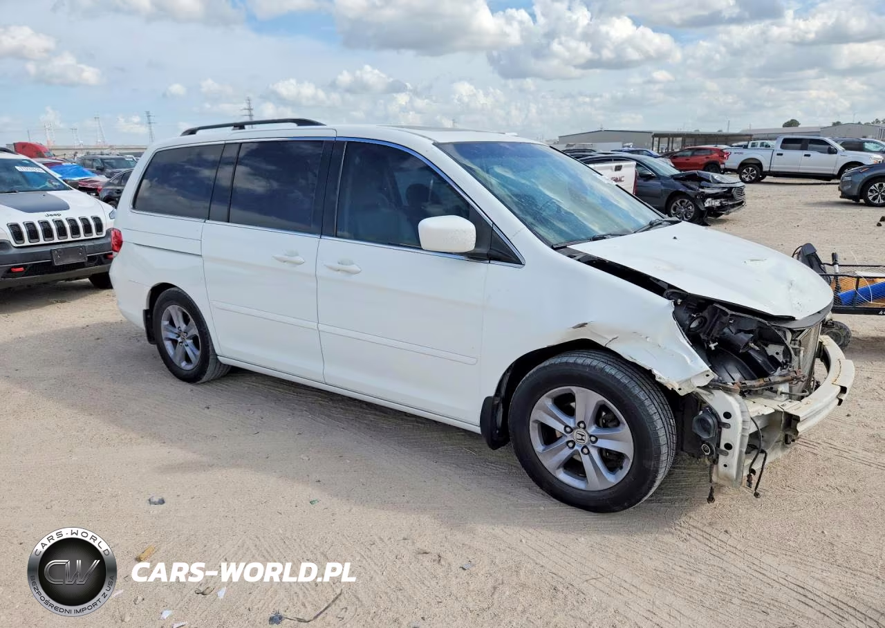 2010 Honda Odyssey Touring VIN:5FNRL3H93AB097653 - 4