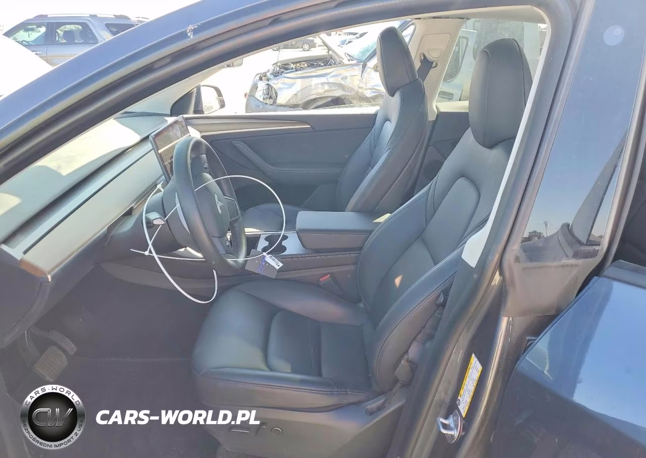 2023 Tesla Model Y VIN:7SAYGDEE6PF711761 - 7