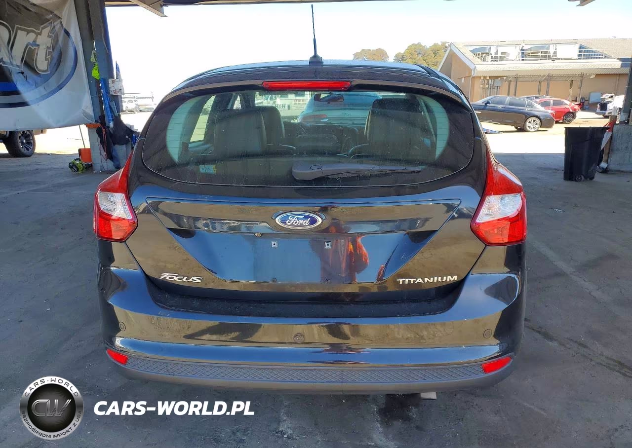 2013 Ford Focus Titanium VIN:1FADP3N20DL382596 - 6