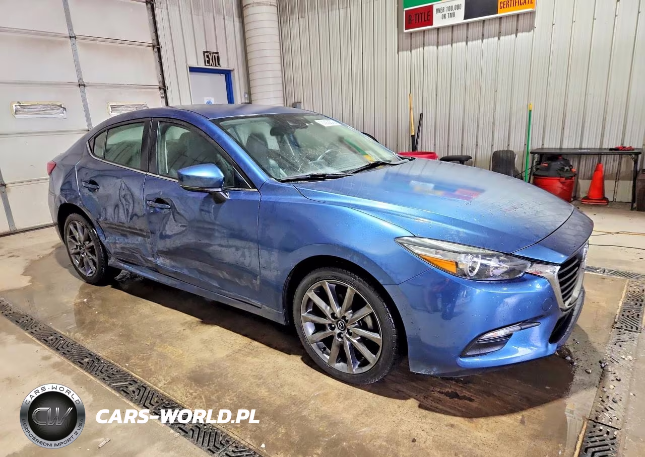 2018 Mazda 3 Touring VIN:3MZBN1V32JM187949 - 4