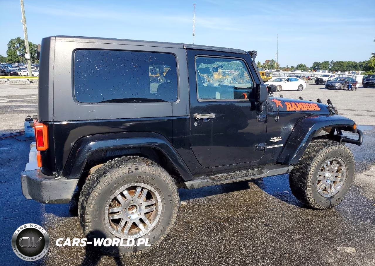 2010 Jeep Wrangler Sahara VIN:1J4GA5D16AL181403 - 3