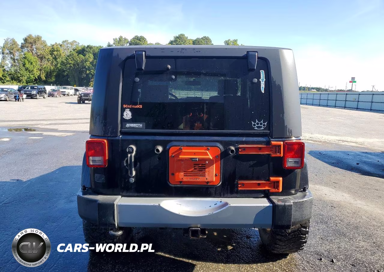 2010 Jeep Wrangler Sahara VIN:1J4GA5D16AL181403 - 6