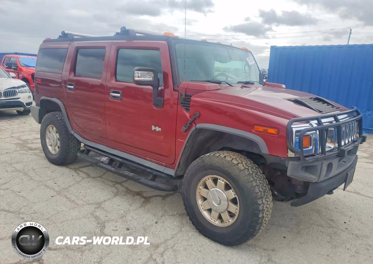 2005 Hummer H2 VIN:5GRGN23UX5H110152 - 4