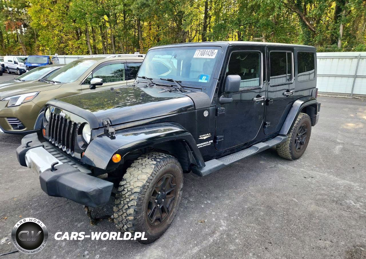 2012 Jeep Wrangler Unlimited Sahara VIN:1C4BJWEG5CL173448 - 1