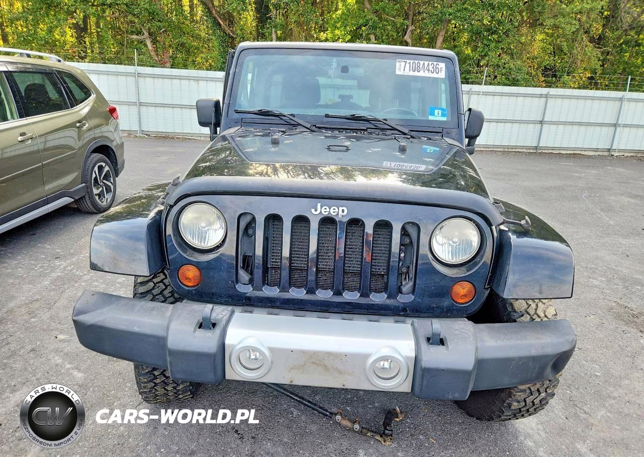 2012 Jeep Wrangler Unlimited Sahara VIN:1C4BJWEG5CL173448 - 5
