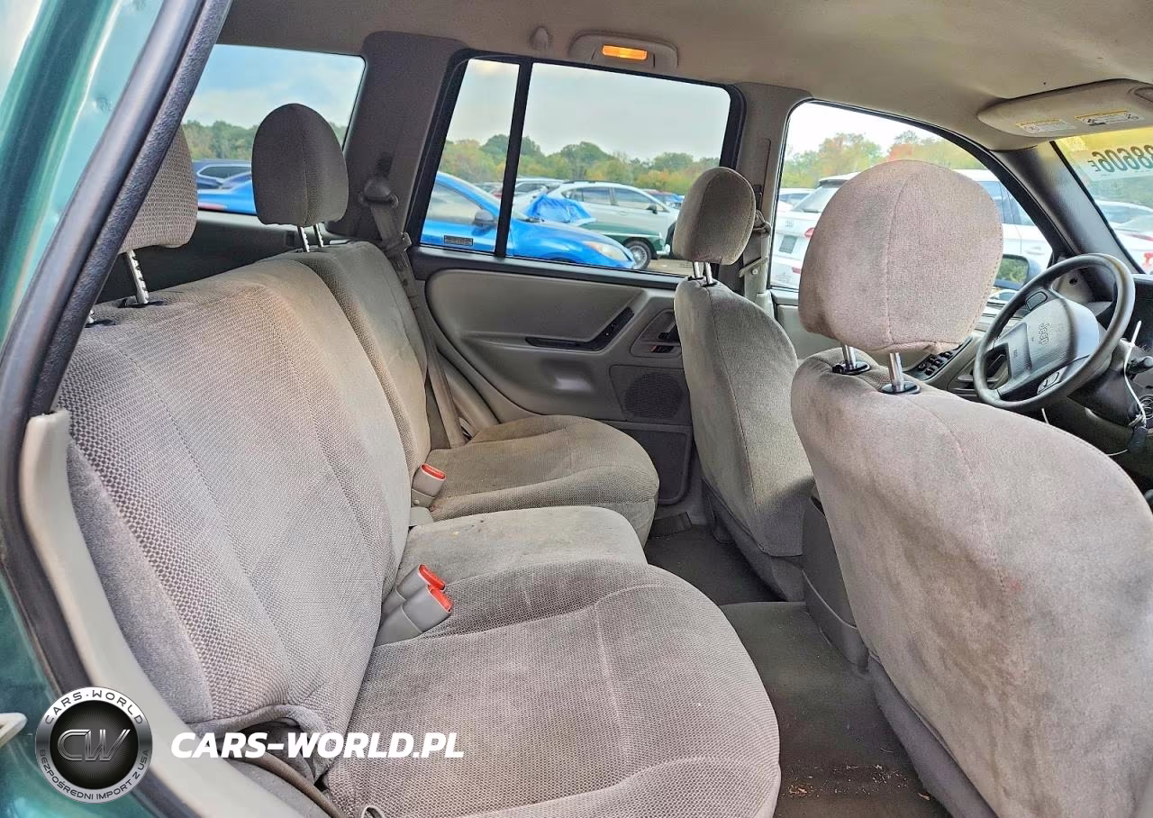 1999 Jeep Grand Cherokee Laredo VIN:1J4GW58S1XC680154 - 11