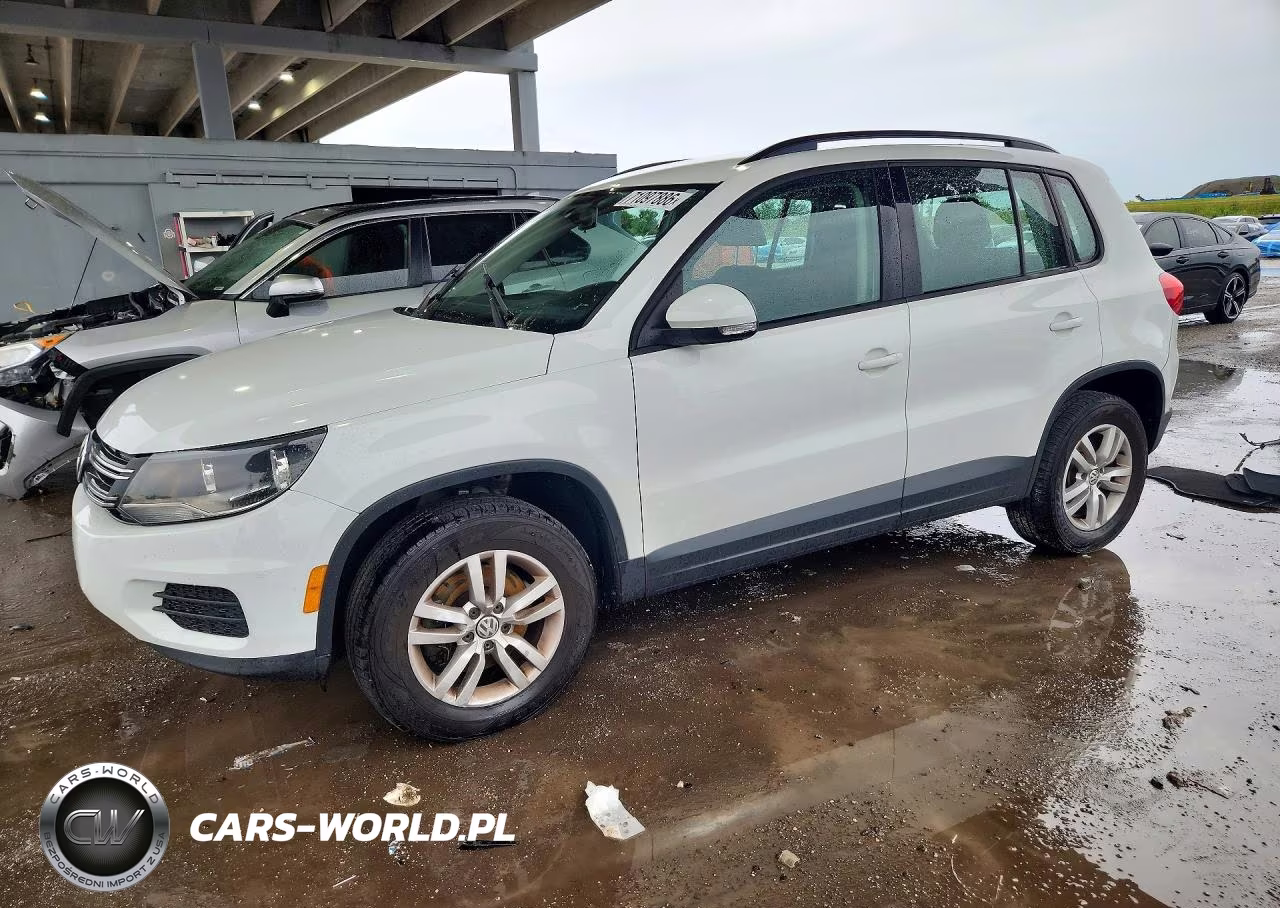 2015 Volkswagen Tiguan S VIN:WVGBV7AX1FW102052 - 1