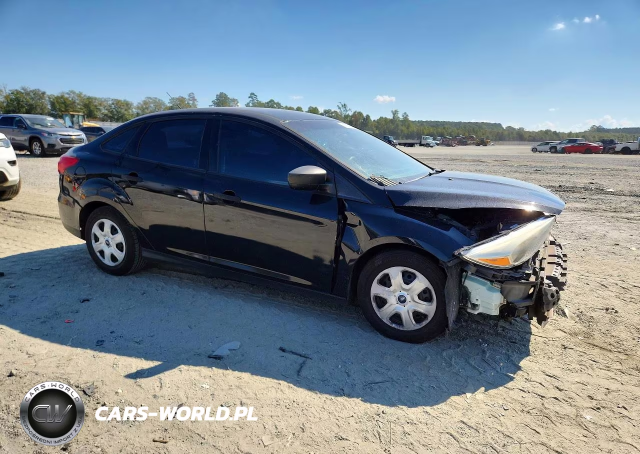 2017 Ford Focus S VIN:1FADP3E29HL337386 - 4