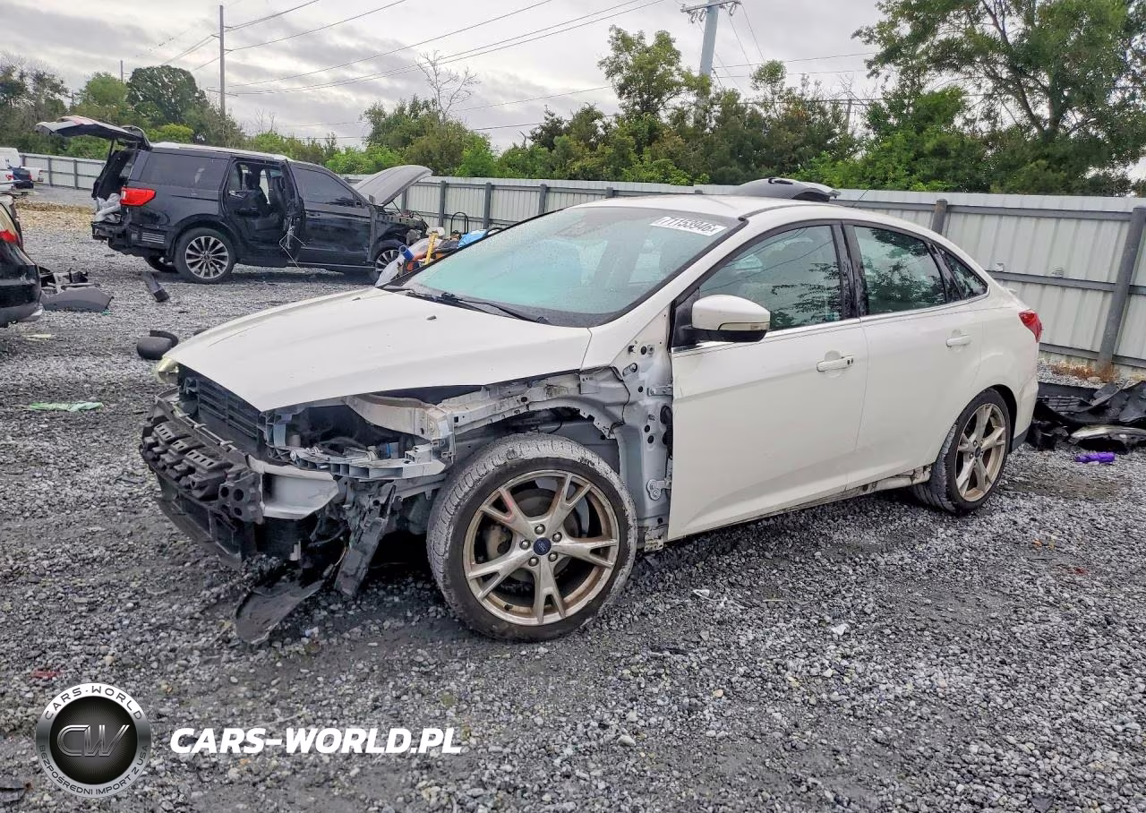 2016 Ford Focus Titanium VIN:1FADP3J27GL232835 - 1