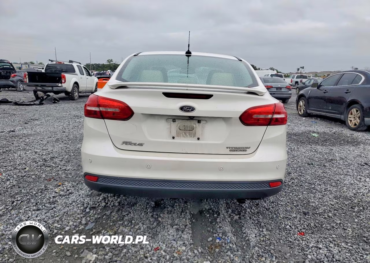 2016 Ford Focus Titanium VIN:1FADP3J27GL232835 - 6