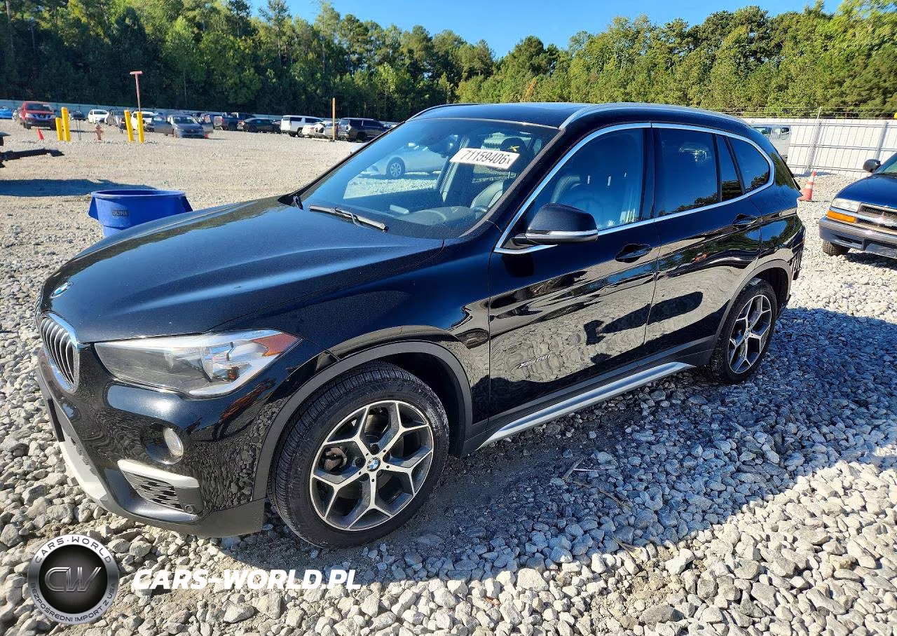 2018 BMW X1 xDrive28I VIN:WBXHT3C31J5K28534 - 1