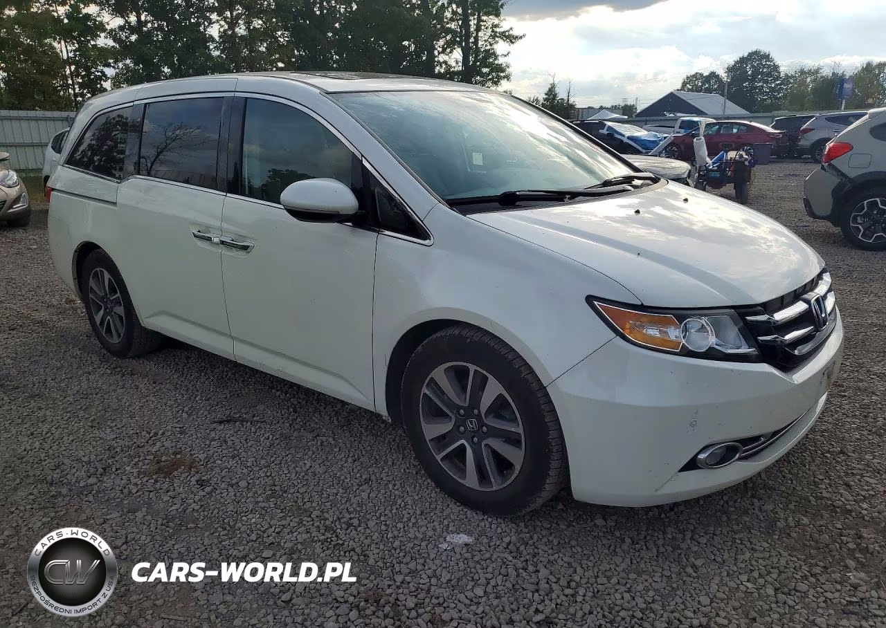 2014 Honda Odyssey Touring VIN:5FNRL5H94EB047328 - 4