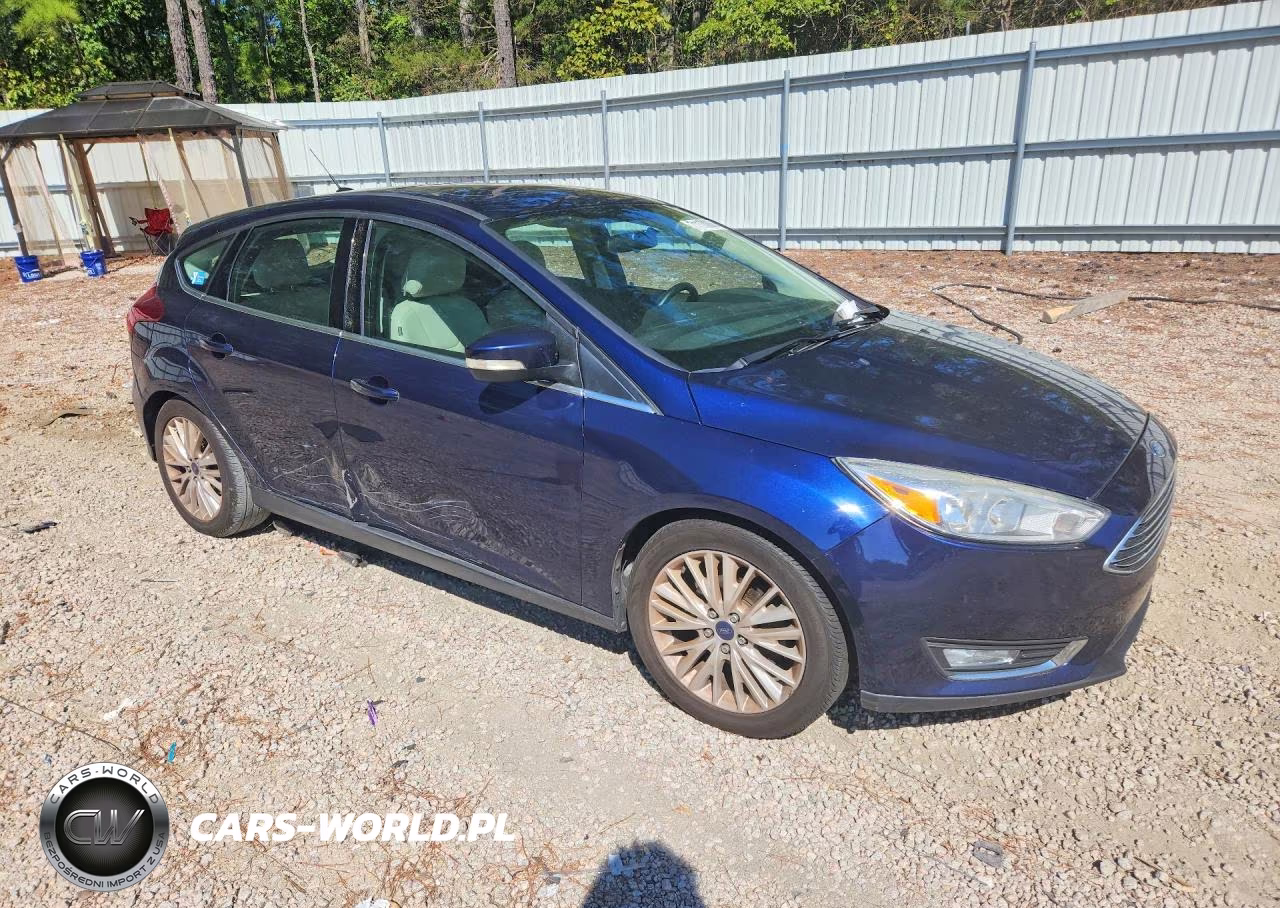 2017 Ford Focus Titanium VIN:1FADP3N23HL279579 - 4