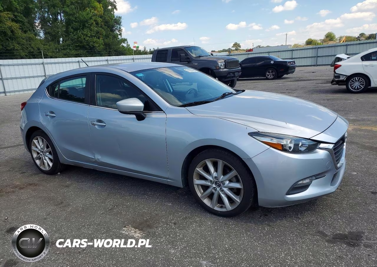2017 Mazda 3 Touring VIN:3MZBN1L7XHM112884 - 4