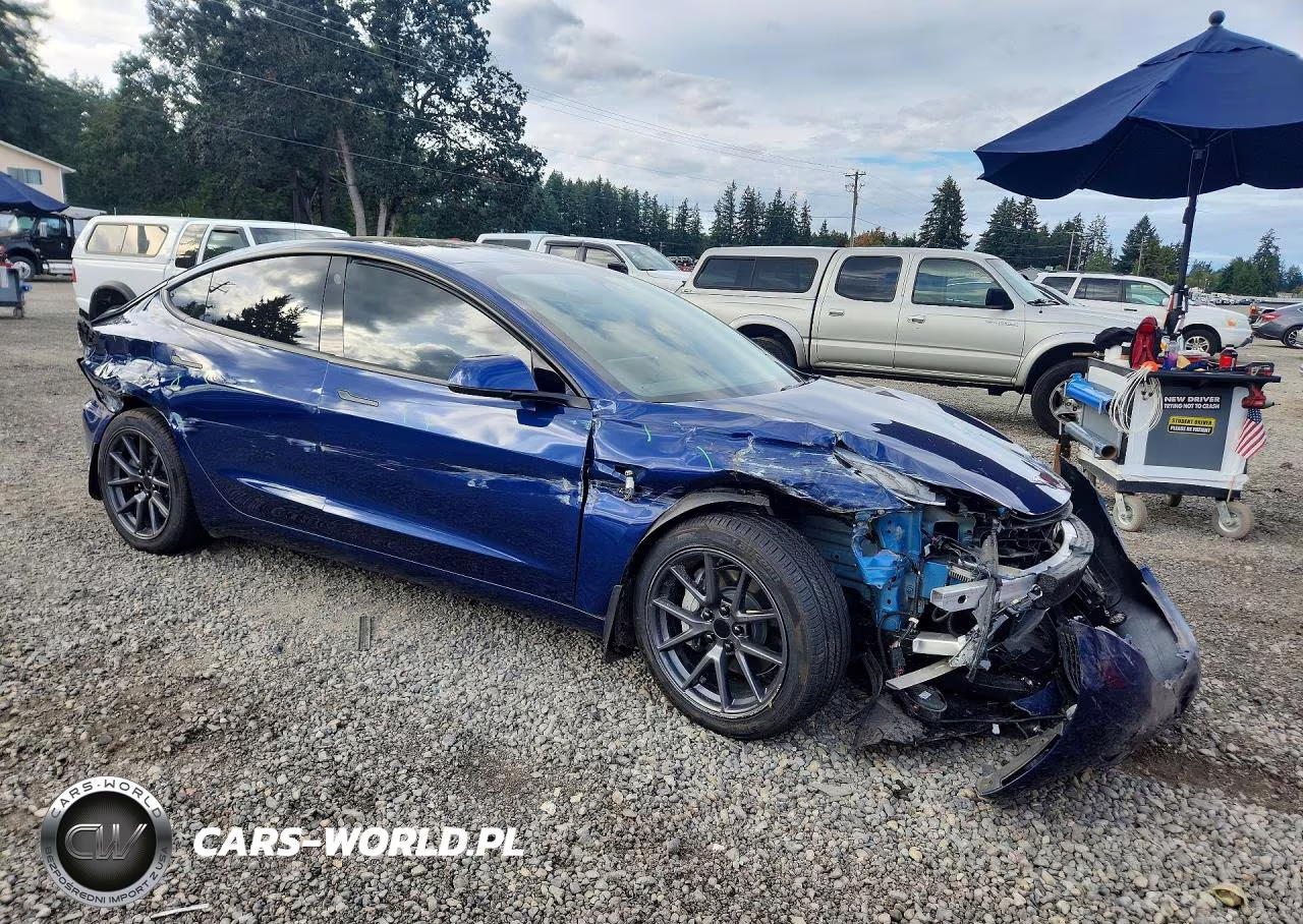 2023 Tesla Model 3 VIN:5YJ3E1EB0PF387417 - 4