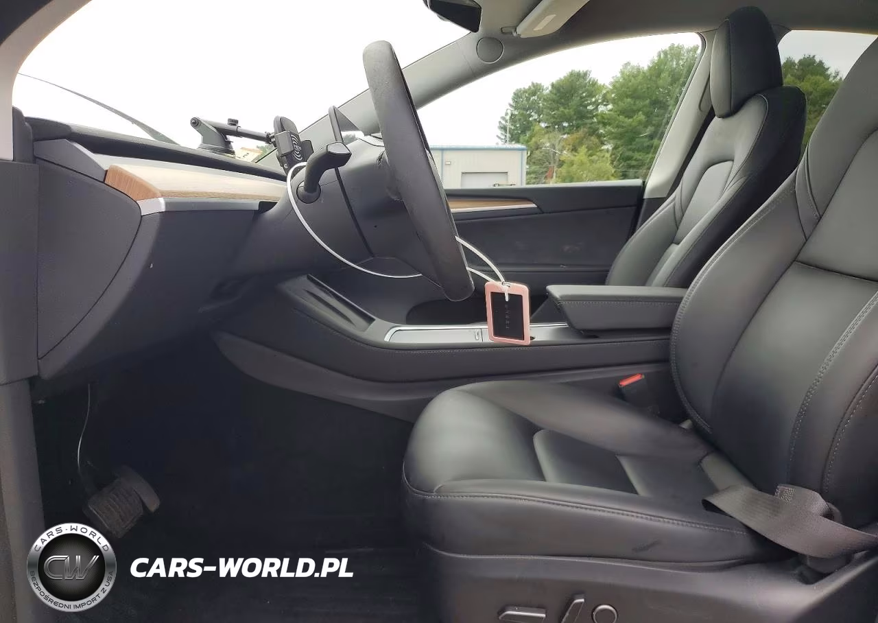 2023 Tesla Model Y VIN:7SAYGDEE4PA115478 - 7