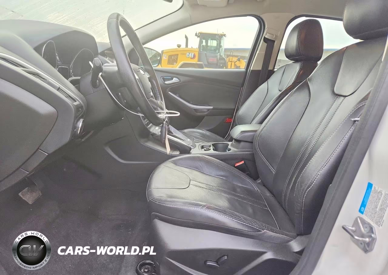 2012 Ford Focus Titanium VIN:1FAHP3N29CL462589 - 7