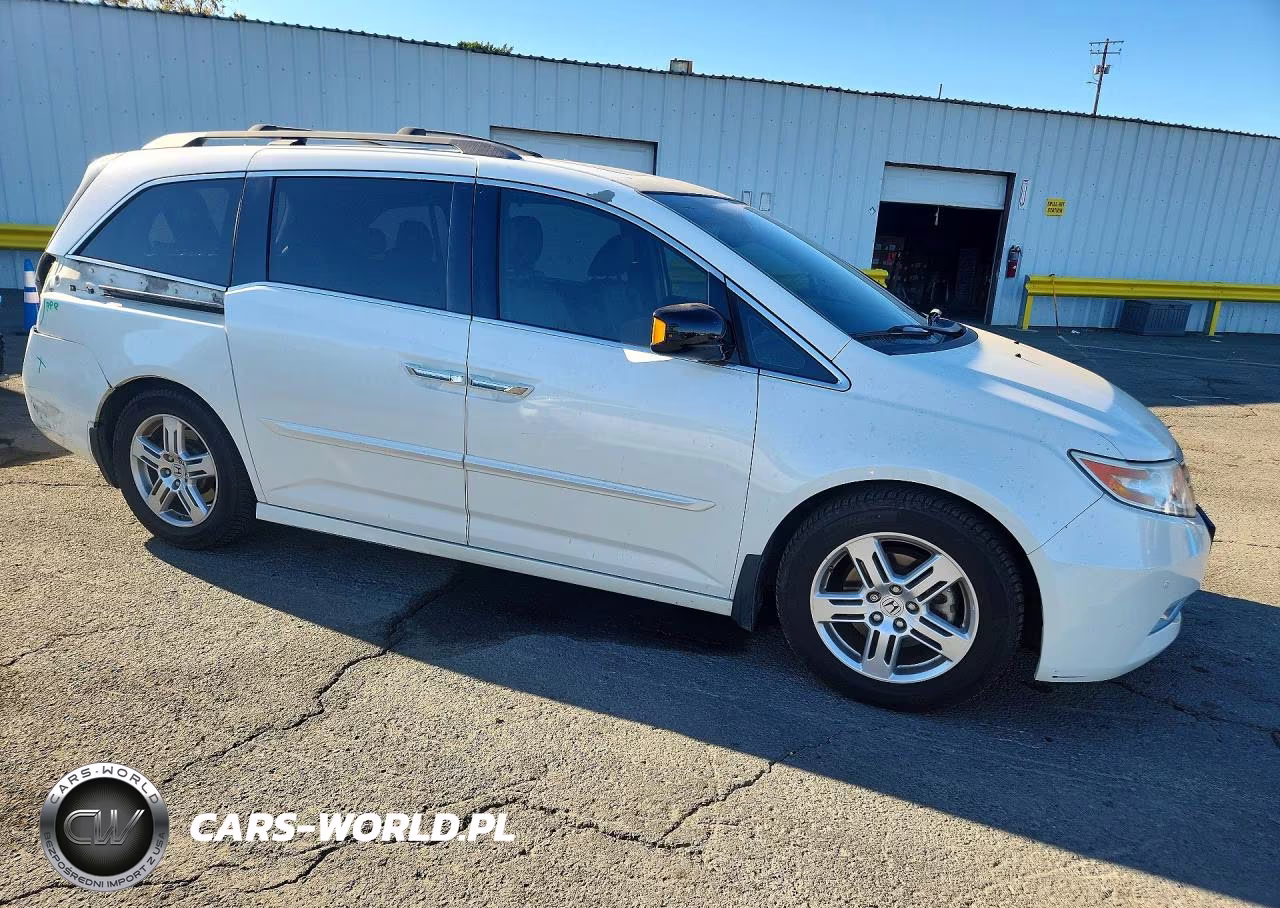 2012 Honda Odyssey Touring VIN:5FNRL5H9XCB009728 - 4