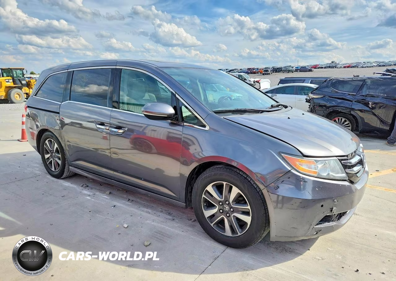 2016 Honda Odyssey Touring VIN:5FNRL5H96GB145649 - 4