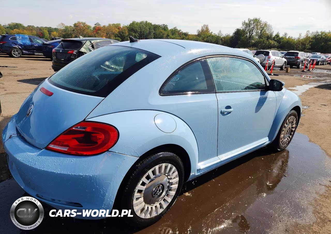 2014 Volkswagen Beetle VIN:3VWJ17AT3EM666421 - 3