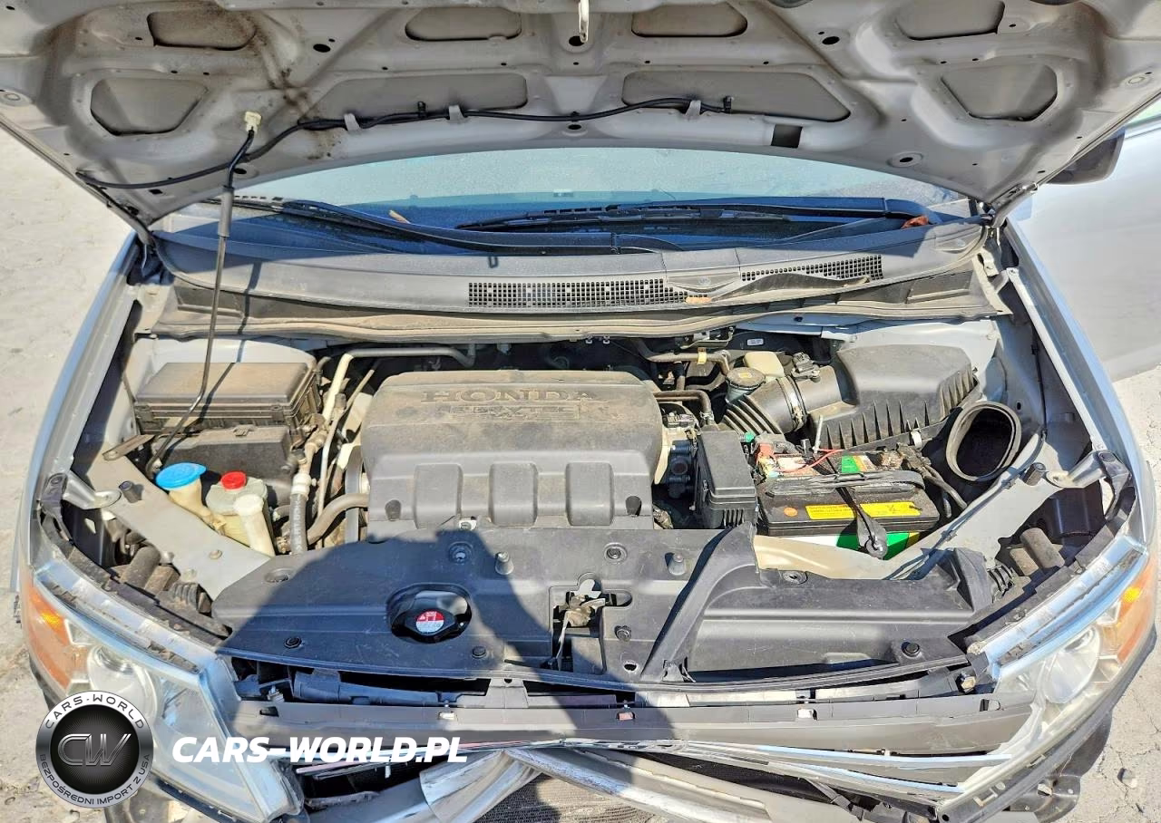 2012 Honda Odyssey Exl VIN:5FNRL5H67CB041011 - 12